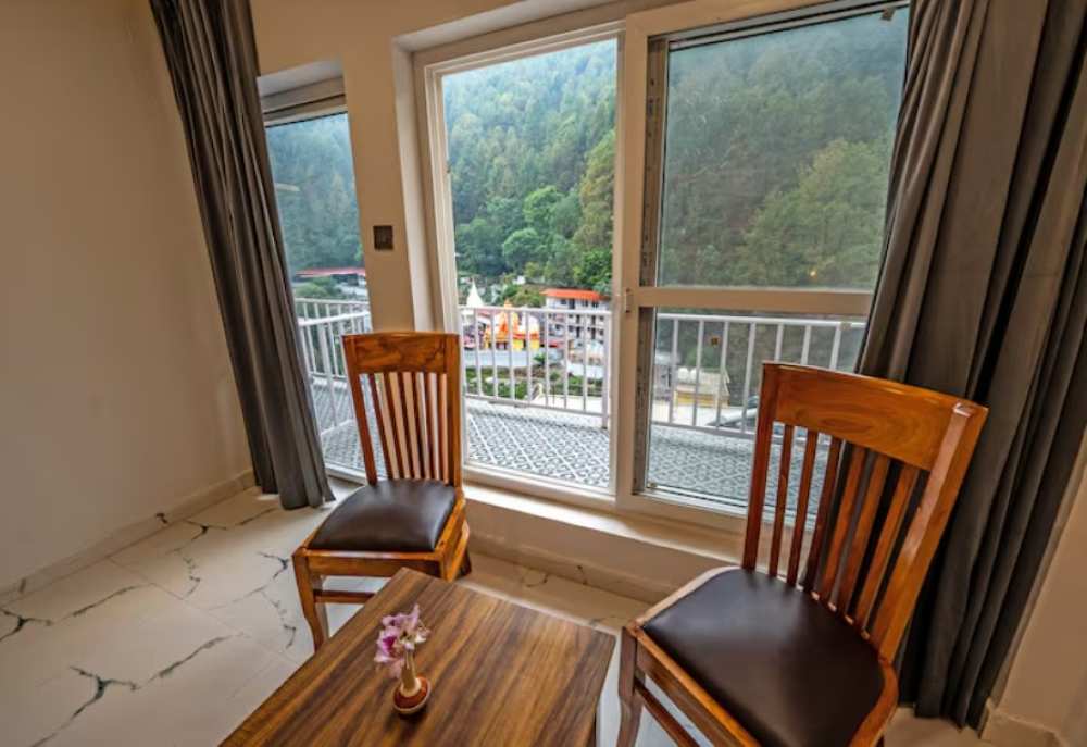 kainchi_divine_retreat_hotel_premium_dham_view_balcony