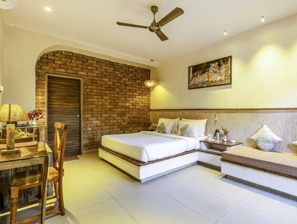 luxury-cottage-sitout-area-pugmark-resort-bedroom