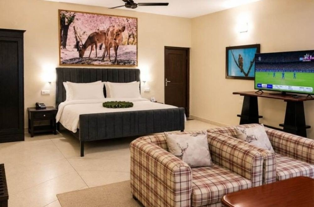 Bel-la-Monde-Riverside-Resort-Jim-Corbett-deluxe-room-bedroom